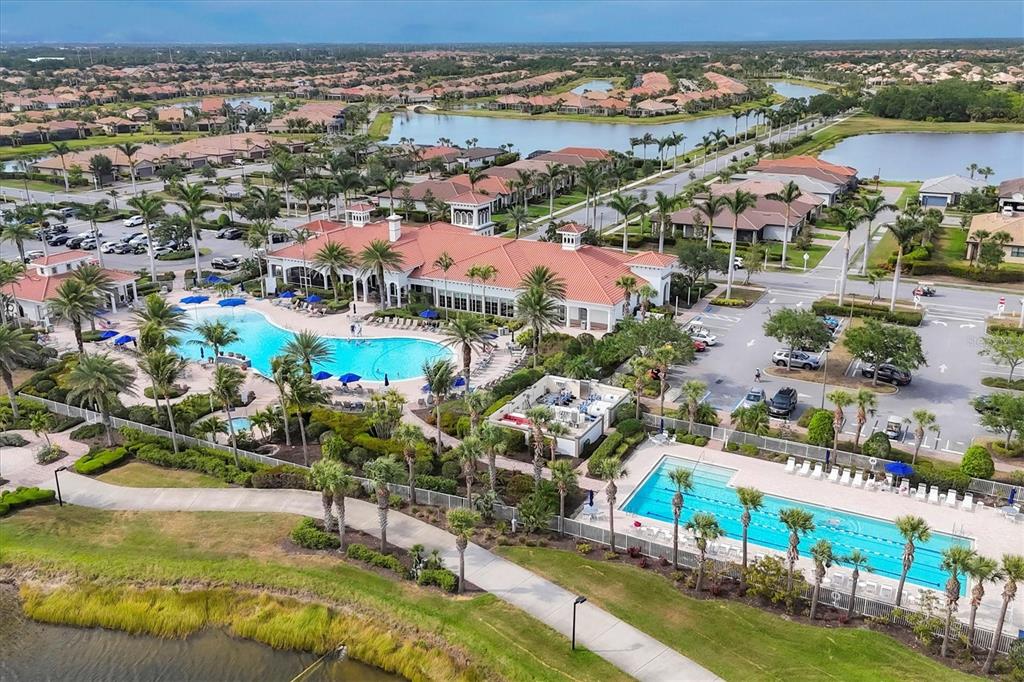 13057 Rinella Street Venice, FL 34293 - Photo 66 of 85 a view of a city with lots of residential buildings ocean and mountain view