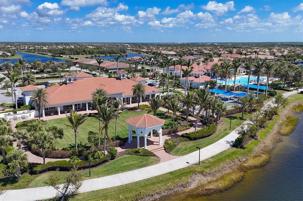 13057 Rinella Street Venice, FL 34293 - Photo 84 of 85 an aerial view of residential houses with outdoor space and ocean view