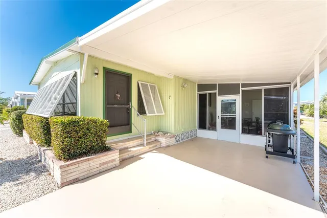 a front view of a house with a outdoor space