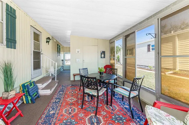 a view of a livingroom with furniture