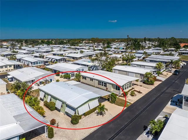 an aerial view of a balcony with an ocean