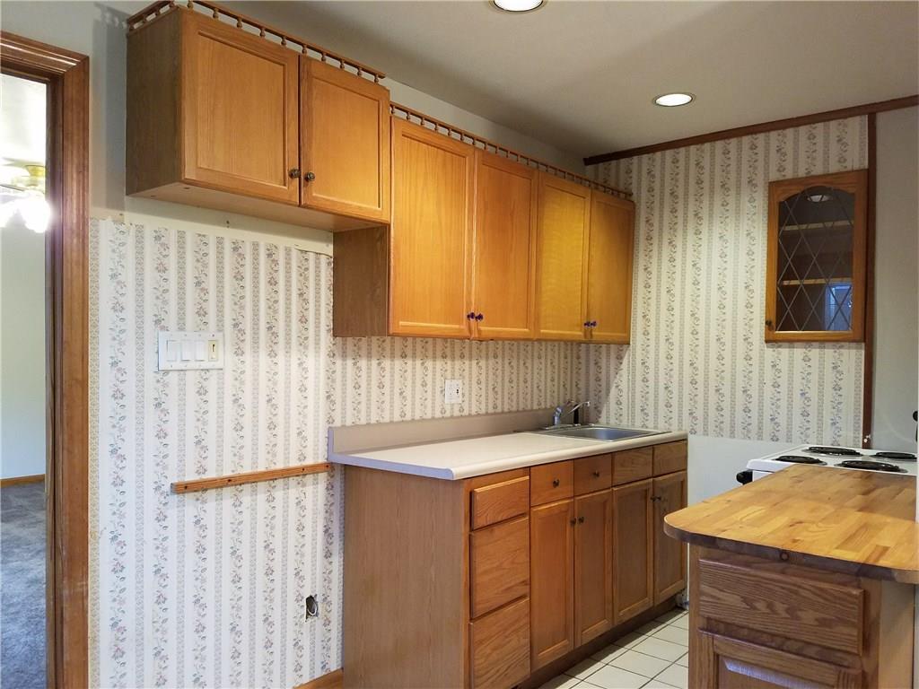 154 Stoup Road Mars, PA 16046 - Photo 23 of 25 Lower level kitchenette with electric range.