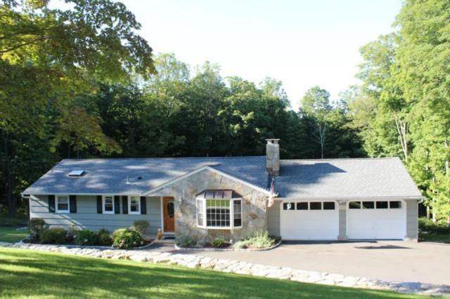 19 Fillmore Lane Ridgefield, CT 06877 - Photo 1 of 1 a front view of a house with a yard