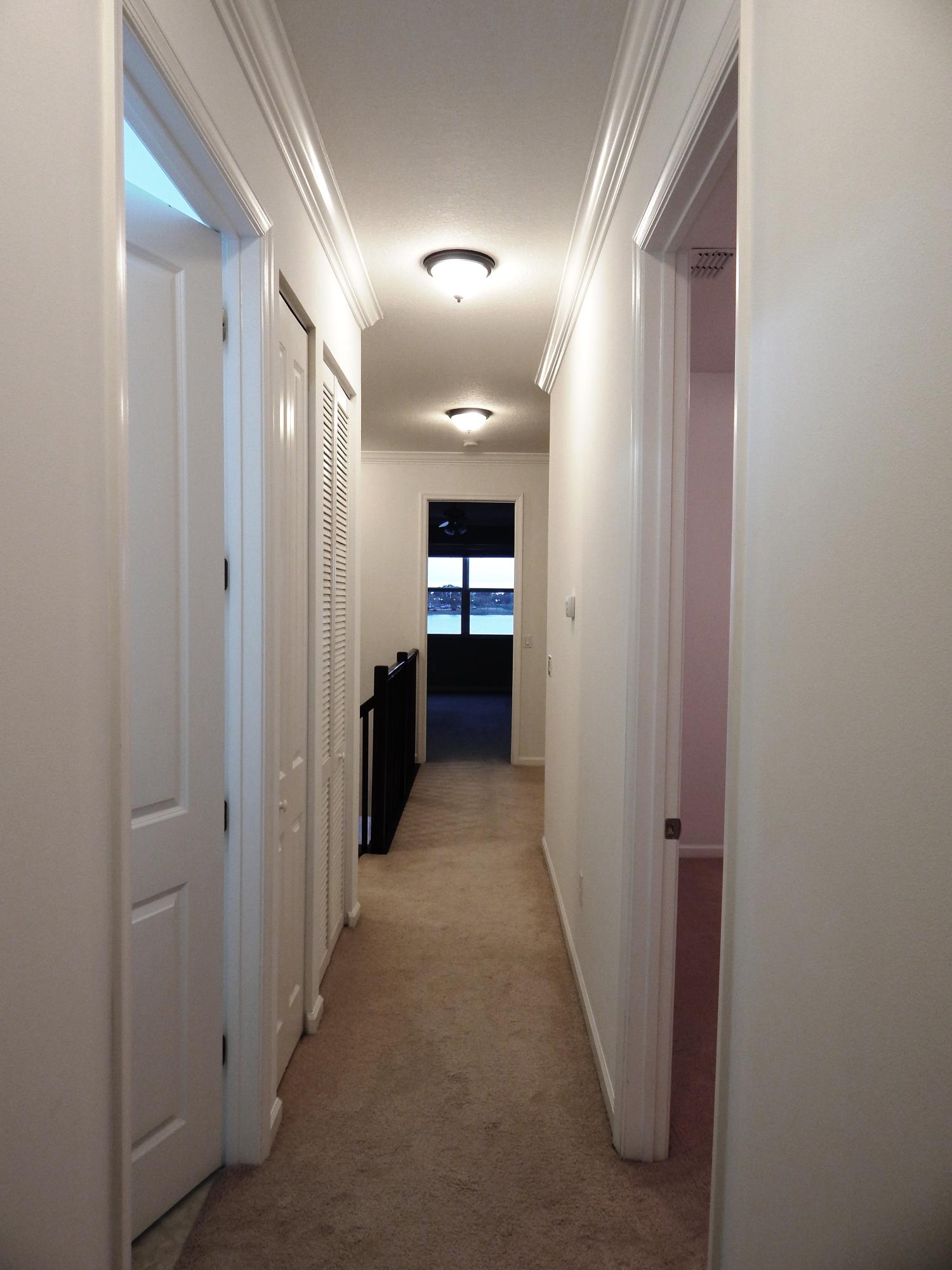 1530 Northwest 48th Lane, Unit 1530 Boca Raton, FL 33431 - Photo 11 of 13 1530 Hall frm Guest Ba to Ma bedrm