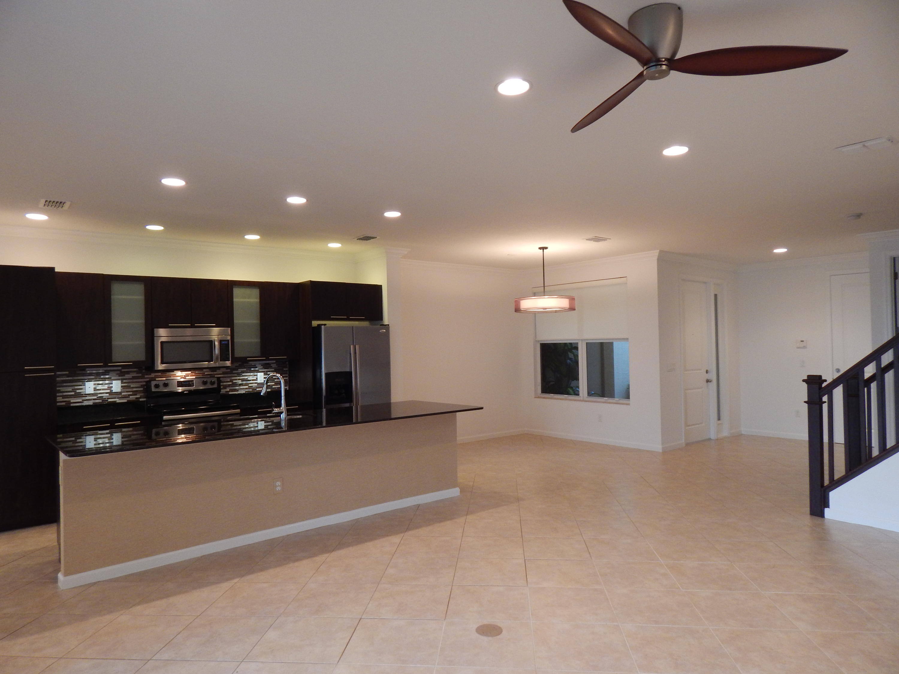1530 Northwest 48th Lane, Unit 1530 Boca Raton, FL 33431 - Photo 3 of 13 1530 lvg rm to dng rm