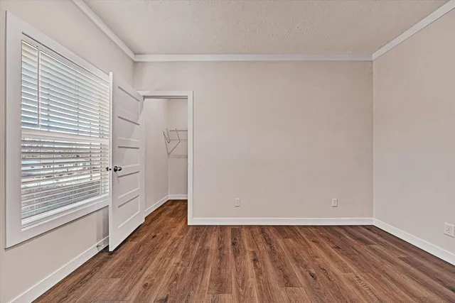 a view of a house with a yard covered with snow in the yard