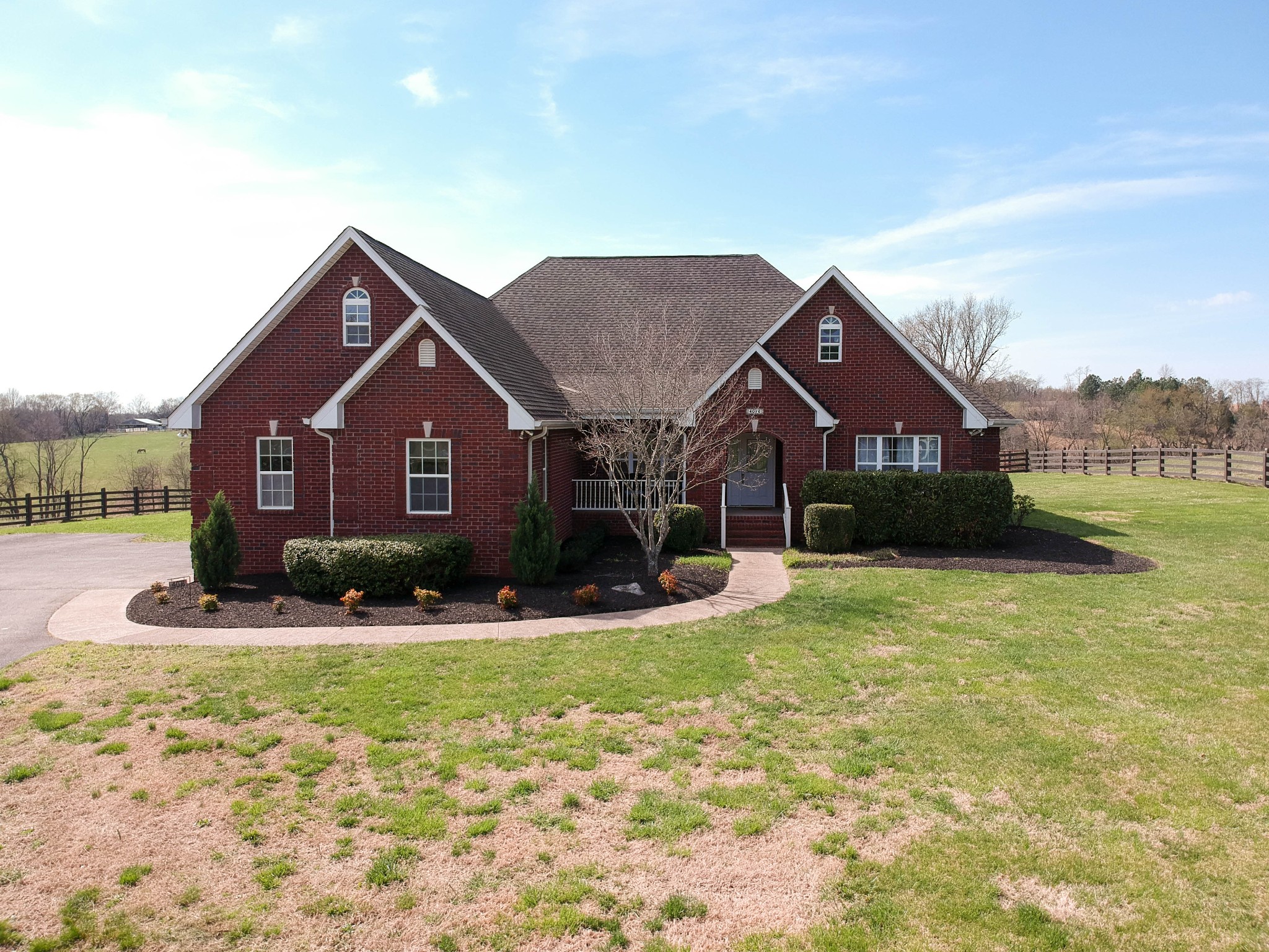 4076 Airport Road Springfield, TN 37172 - Photo 1 of 11 a front view of a house with yard and green space