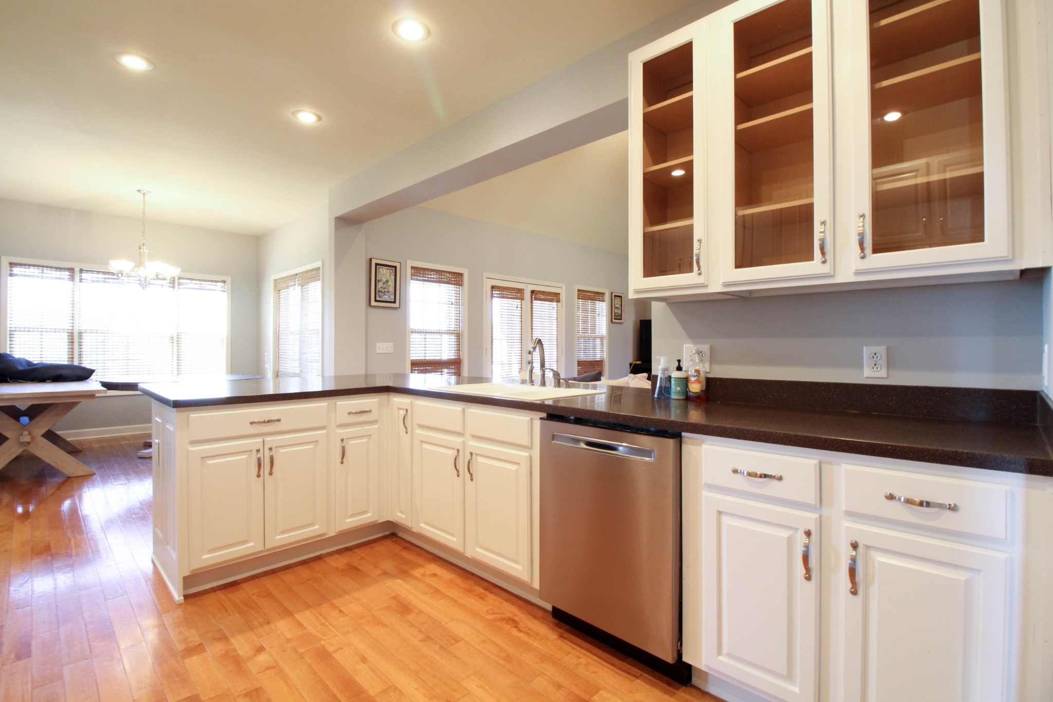4076 Airport Road Springfield, TN 37172 - Photo 11 of 11 a kitchen with granite countertop white cabinets and white appliances