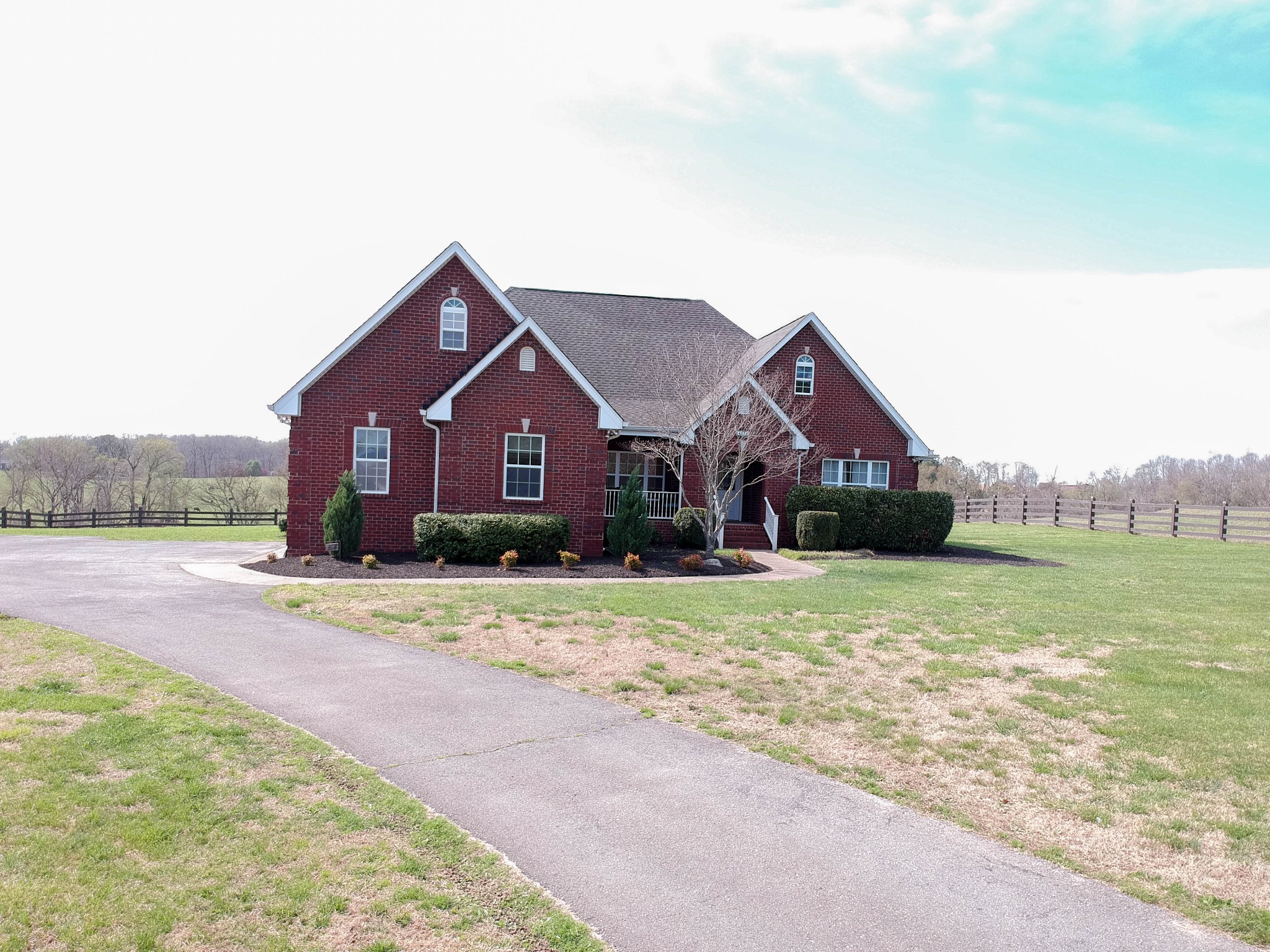 4076 Airport Road Springfield, TN 37172 - Photo 2 of 11 a front view of a house with a yard and road