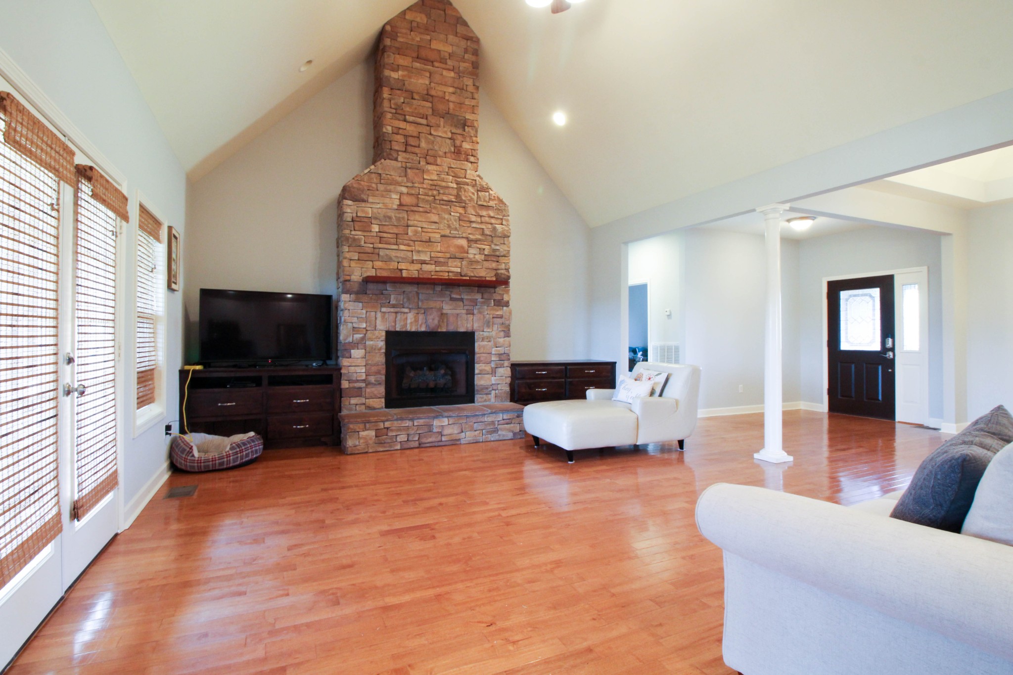 4076 Airport Road Springfield, TN 37172 - Photo 8 of 11 a living room with furniture and a flat screen tv