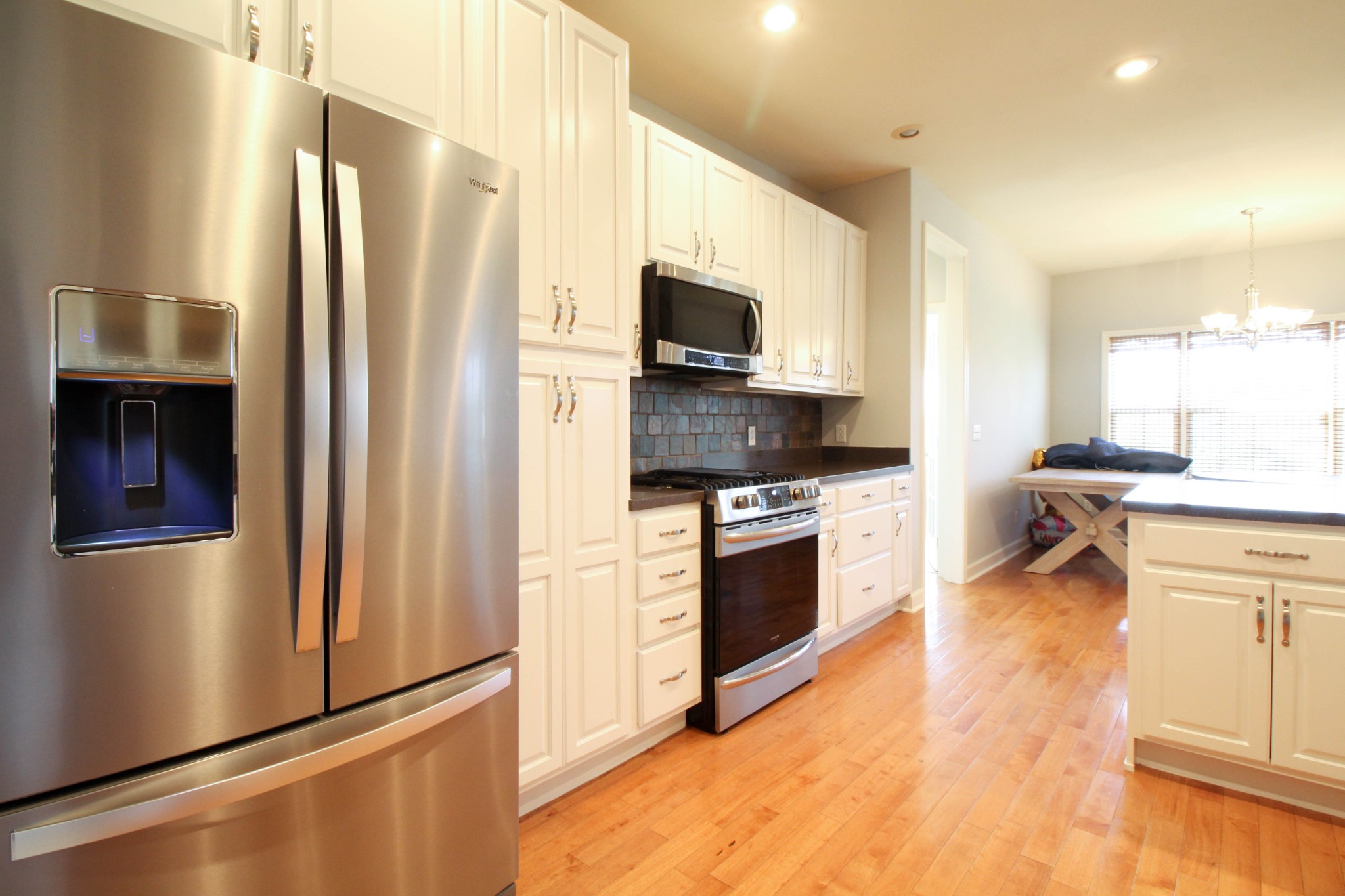 4076 Airport Road Springfield, TN 37172 - Photo 10 of 11 a kitchen with stainless steel appliances a refrigerator stove and sink