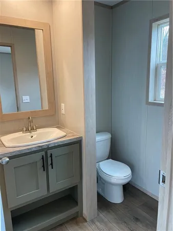 an empty room with windows and gate