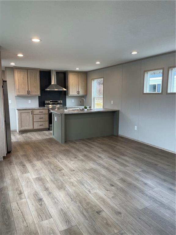 1408 A Hidden Valley Road Bulger, PA 15019 - Photo 3 of 15 a kitchen with stainless steel appliances granite countertop a sink a stove top oven a counter space and cabinets