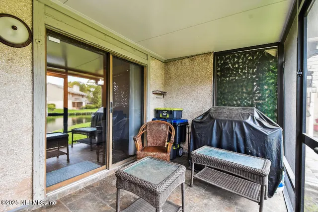 a living room with furniture and a gate