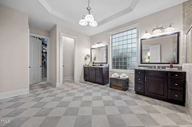 a white toilet sitting next to a bath tub