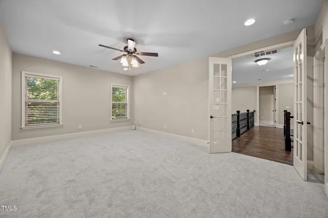a view of kitchen with cabinets and stainless steel appliances
