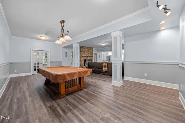a view of a house with backyard and deck