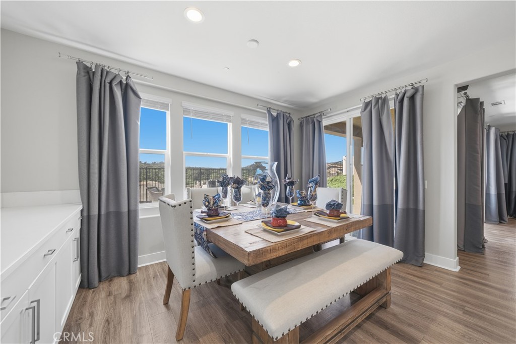 346 Ventasso Way Fallbrook, CA 92028 - Photo 14 of 56 a view of a kitchen with a table and chairs