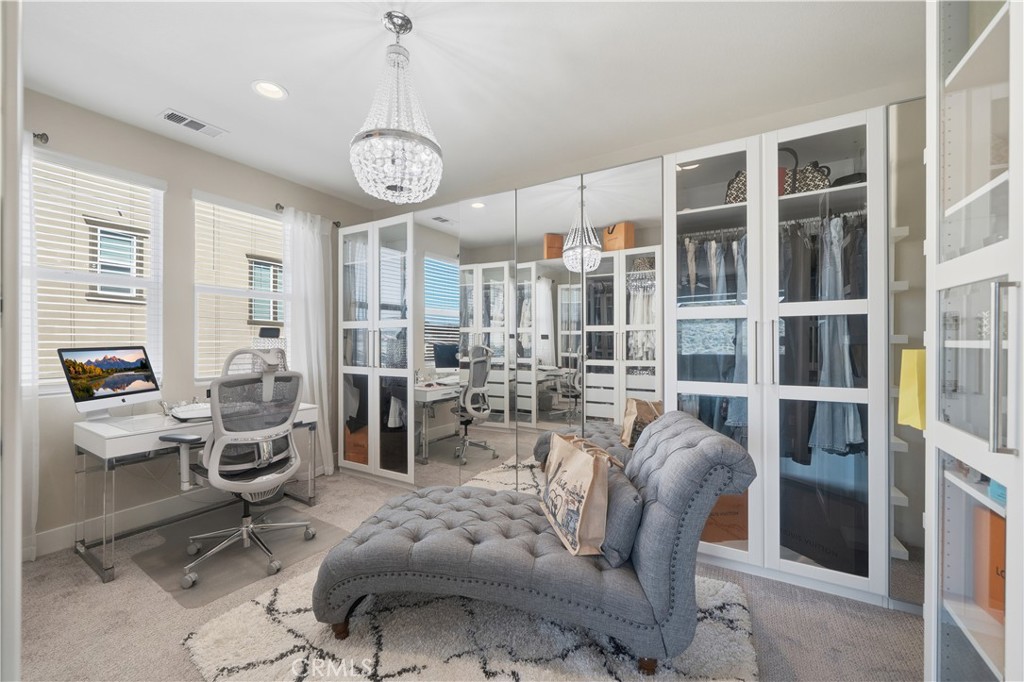 346 Ventasso Way Fallbrook, CA 92028 - Photo 28 of 56 a view of a livingroom with furniture and windows
