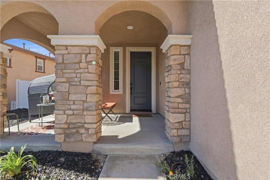 346 Ventasso Way Fallbrook, CA 92028 - Photo 4 of 56 a living room with furniture and a fireplace