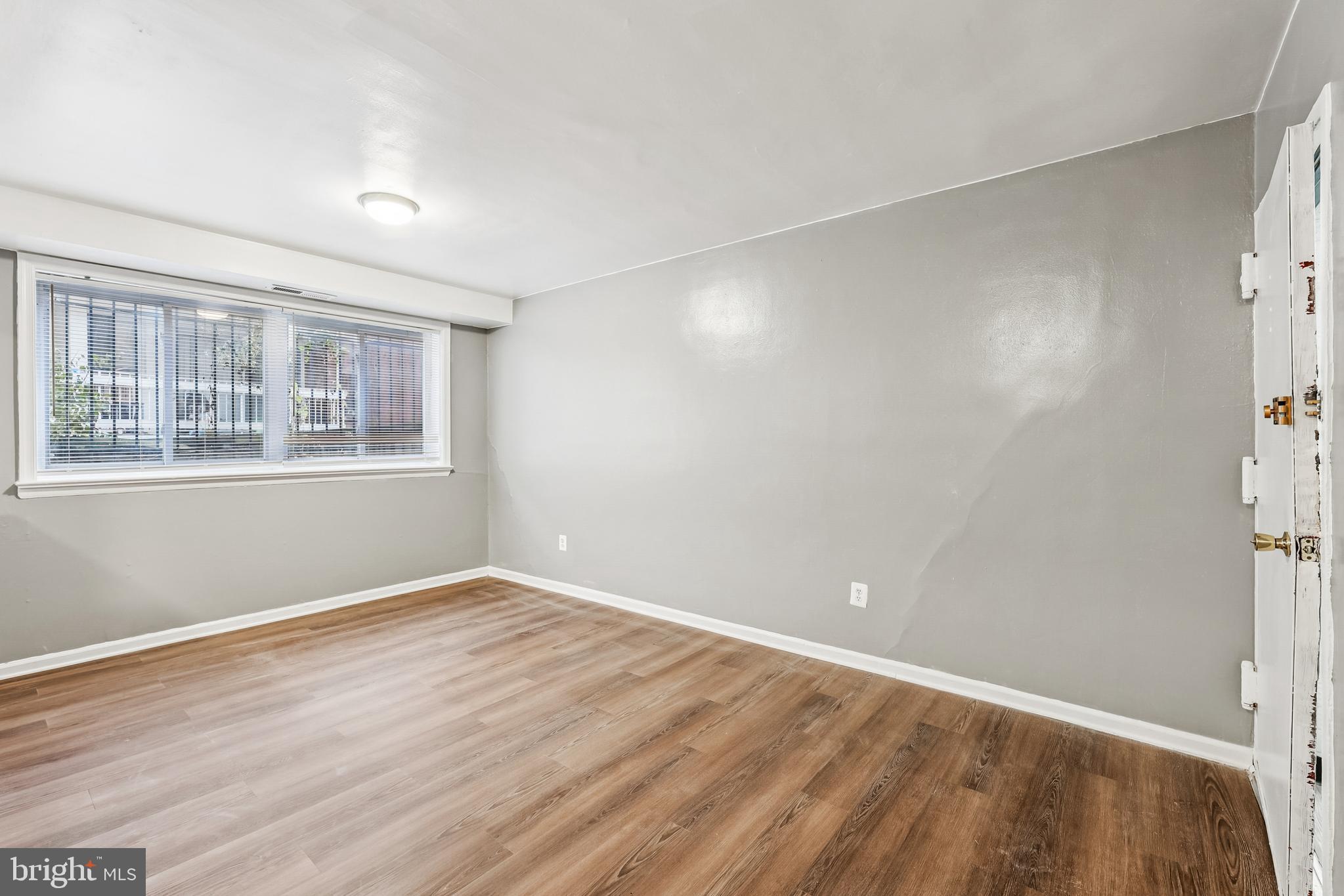2640 Wade Road Southeast, Unit 2 Washington, DC 20020 - Photo 15 of 23 a view of empty room with wooden floor and fan