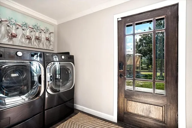 a utility room with dryer and washer