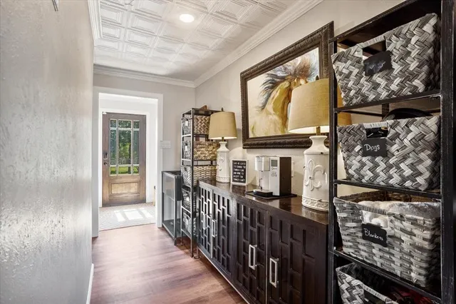 a view of entryway with wooden floor