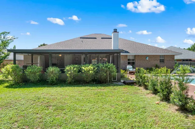 a view of a back yard of the house