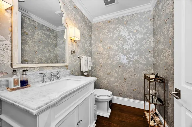 a utility room with sink dryer and washer