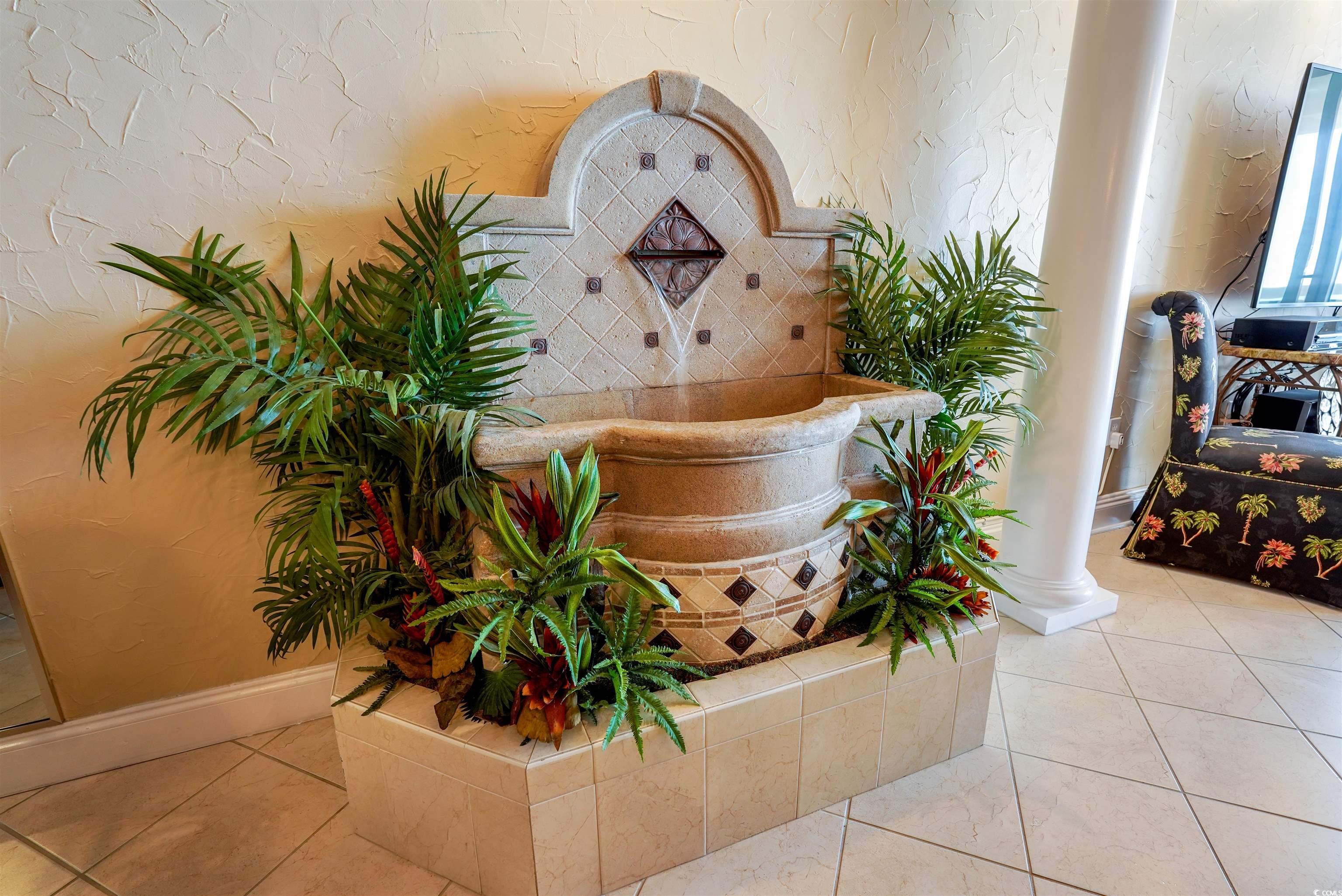 1012 North Waccamaw Drive, Unit 305 Murrells Inlet, SC 29576 - Photo 12 of 38 Detailed view of baseboards and ornate columns