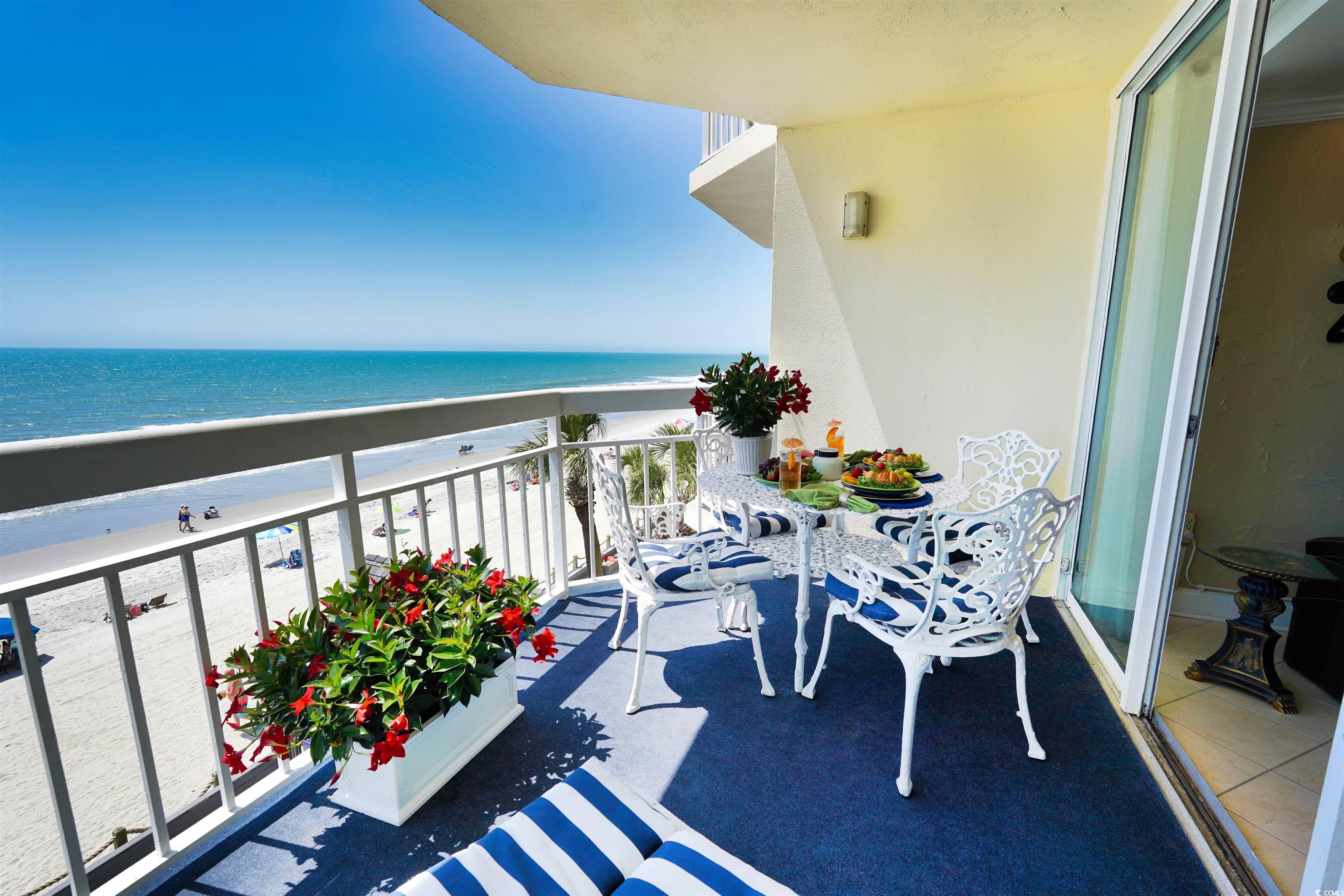 1012 North Waccamaw Drive, Unit 305 Murrells Inlet, SC 29576 - Photo 32 of 38 Balcony with view of water and beach