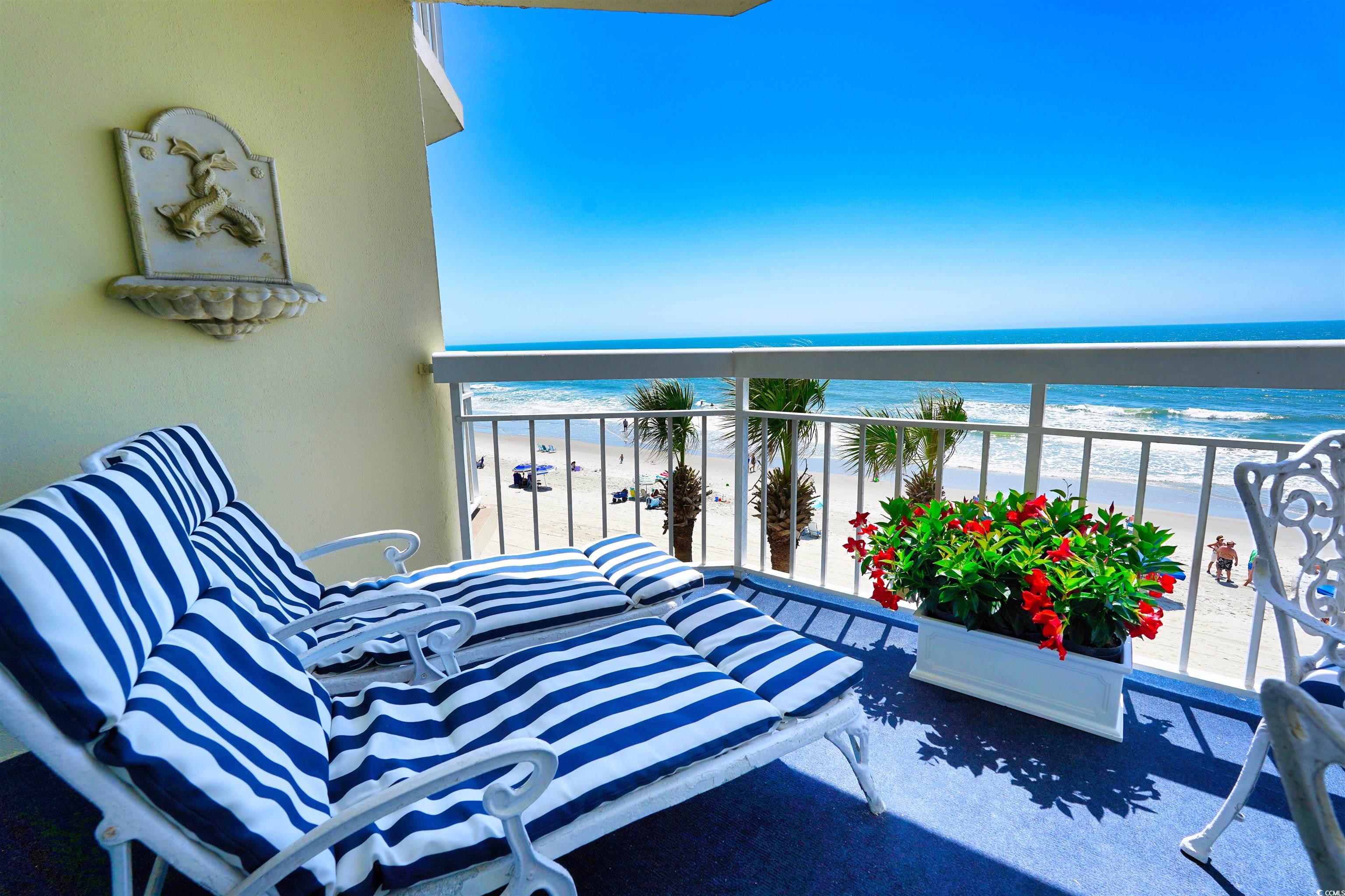 1012 North Waccamaw Drive, Unit 305 Murrells Inlet, SC 29576 - Photo 4 of 38 Balcony with view of water and beach
