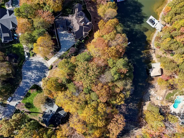 an aerial view of house with yard