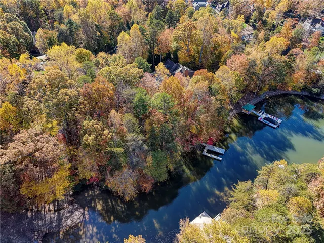 an aerial view of house with yard