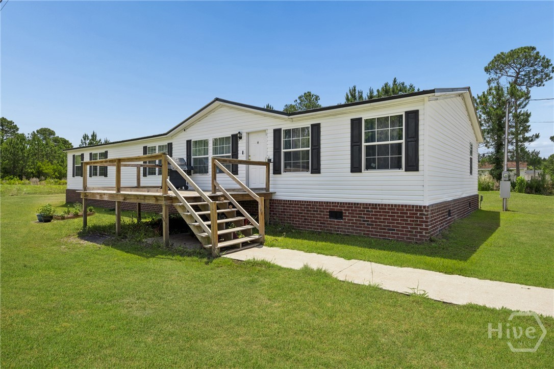 196 Tupelo Loop Ludowici, GA 31316 - Photo 32 of 34 **Grass Virtually enhanced