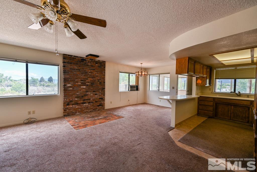 559 Mule Deer Road Coleville, CA 96107 - Photo 21 of 40 a view of an empty room with window and cabinet