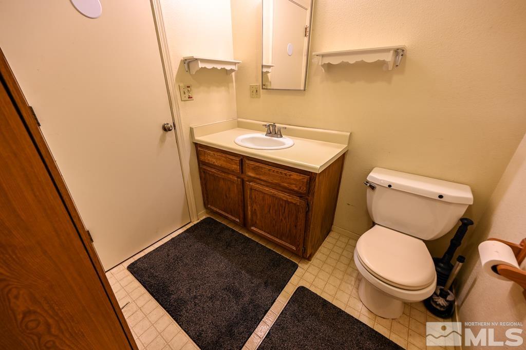559 Mule Deer Road Coleville, CA 96107 - Photo 25 of 40 a bathroom with a sink and a toilet