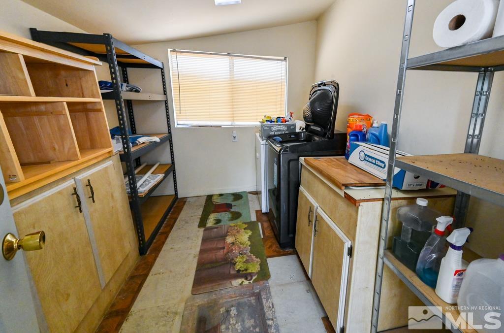 559 Mule Deer Road Coleville, CA 96107 - Photo 33 of 40 a storage room with washer and dryer