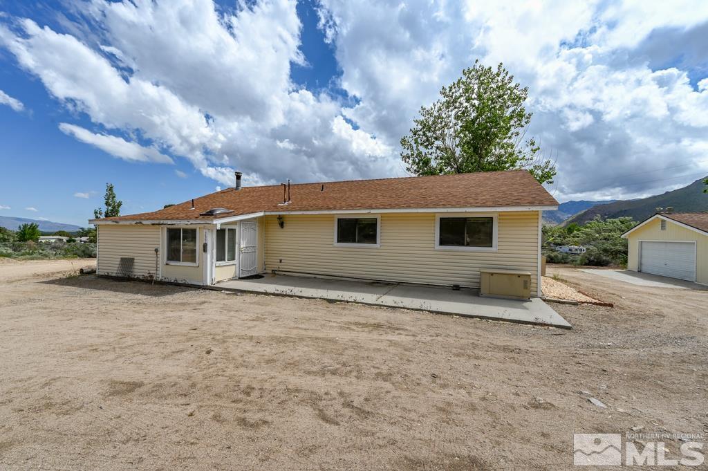 559 Mule Deer Road Coleville, CA 96107 - Photo 7 of 40 a house with trees in the background
