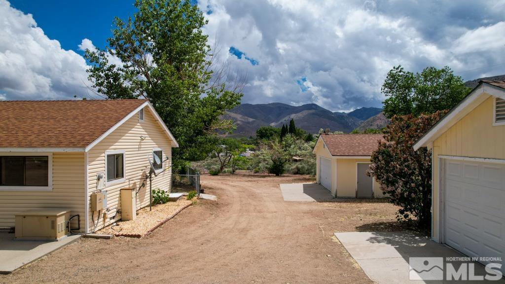 559 Mule Deer Road Coleville, CA 96107 - Photo 8 of 40 a view of a house with a yard and tree s