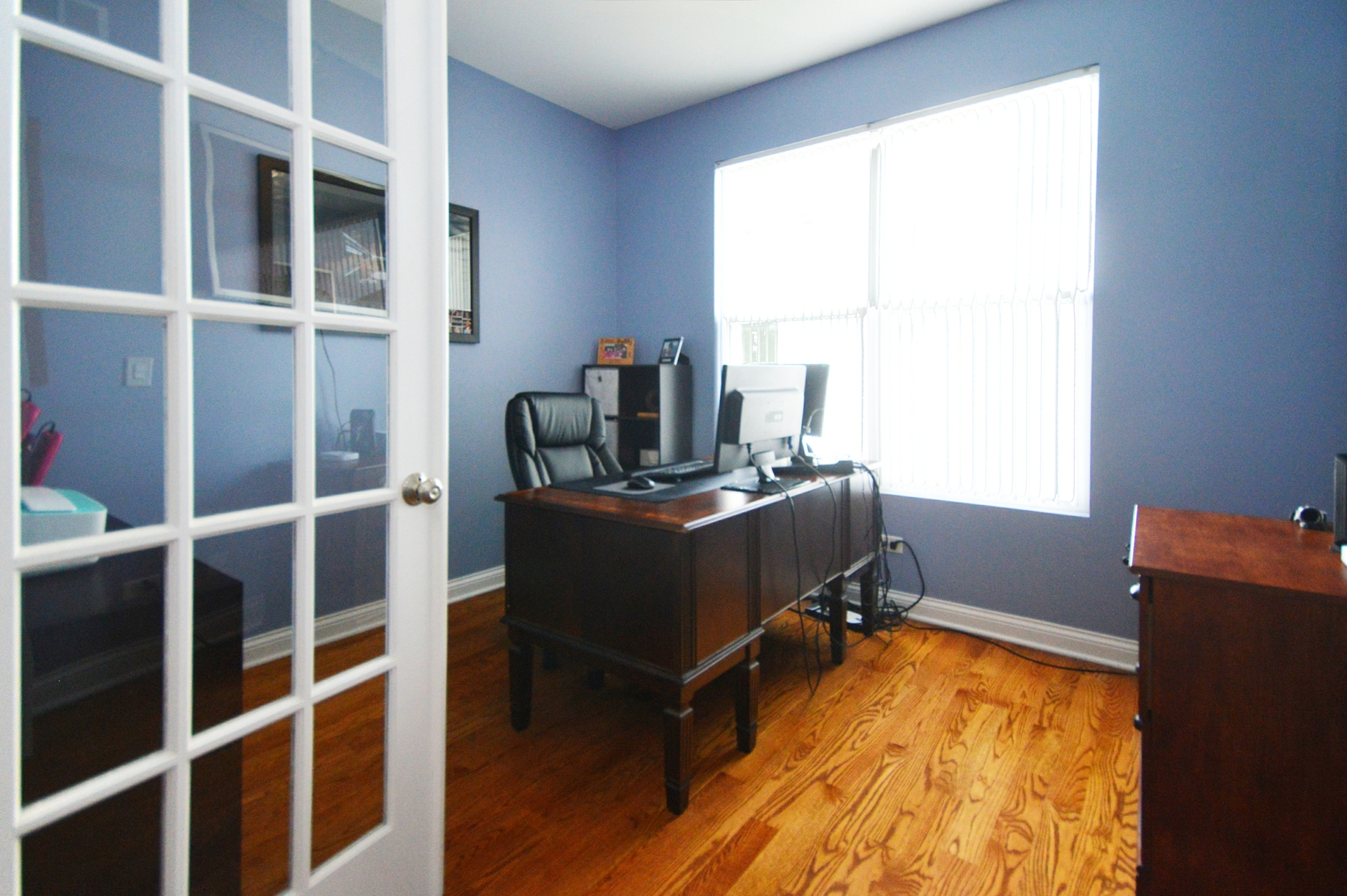 1504 Roth Drive Joliet, IL 60431 - Photo 13 of 27 a room with wooden floor and furniture