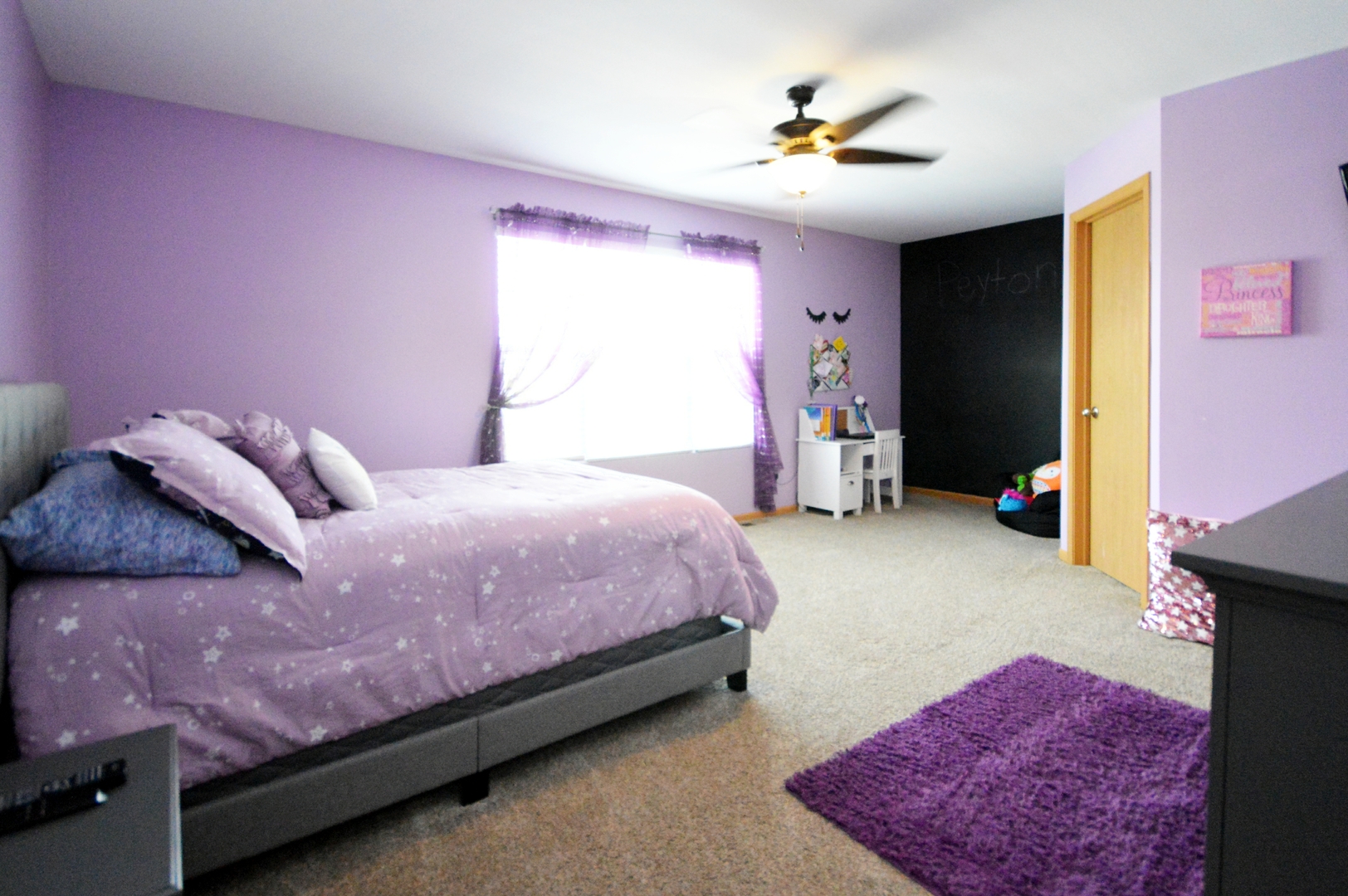 1504 Roth Drive Joliet, IL 60431 - Photo 20 of 27 a bed room with a bed and a chandelier