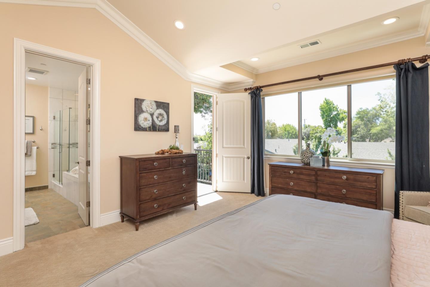 932 Marion Way Sunnyvale, CA 94087 - Photo 13 of 37 a room with a bed and a dresser