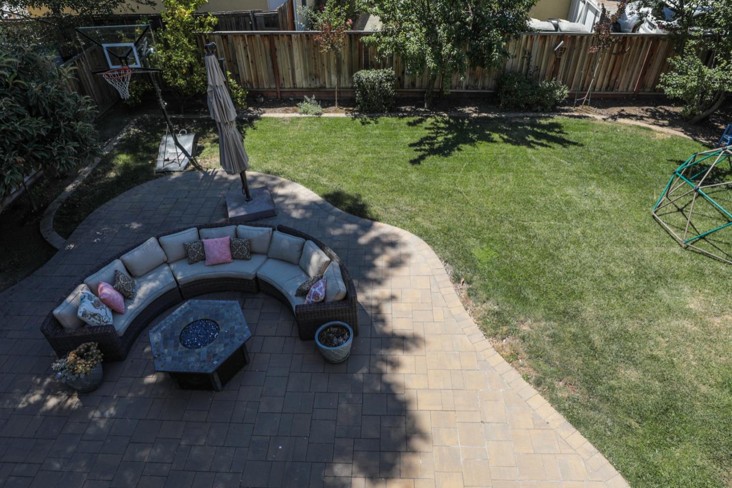 932 Marion Way Sunnyvale, CA 94087 - Photo 17 of 37 a backyard of a house with table and chairs