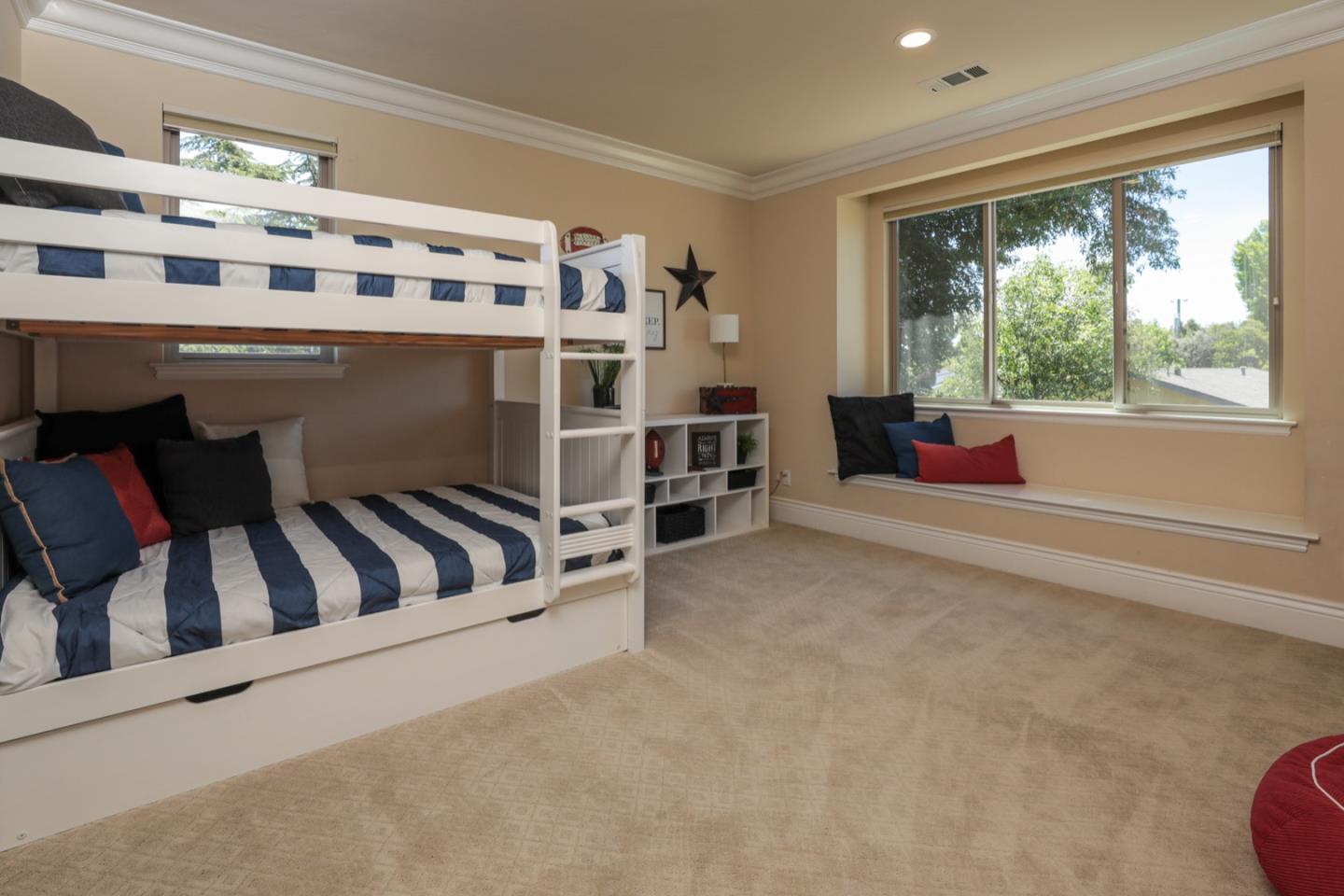 932 Marion Way Sunnyvale, CA 94087 - Photo 19 of 37 a view of an empty room with furniture and window