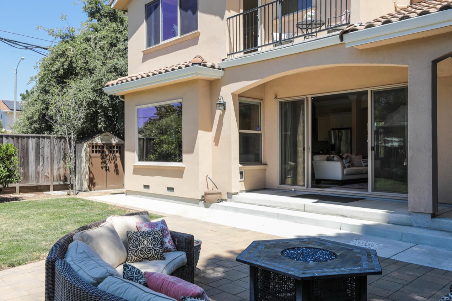 932 Marion Way Sunnyvale, CA 94087 - Photo 25 of 37 a swimming pool with patio outdoor seating and yard
