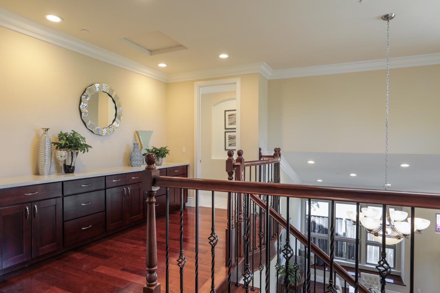 932 Marion Way Sunnyvale, CA 94087 - Photo 28 of 37 a view of a hallway with wooden floor and windows