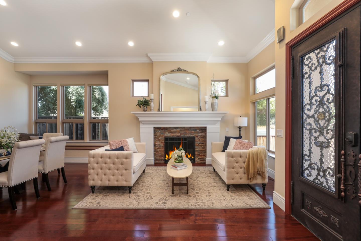 932 Marion Way Sunnyvale, CA 94087 - Photo 30 of 37 a living room with furniture and a fireplace