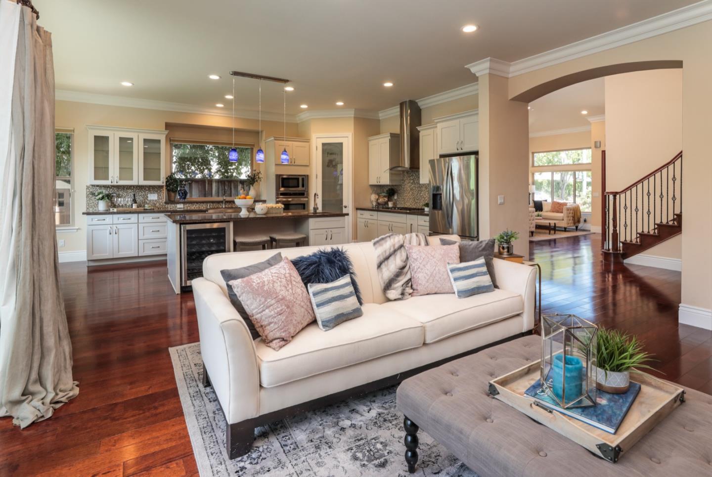 932 Marion Way Sunnyvale, CA 94087 - Photo 5 of 37 a living room with furniture kitchen view and a wooden floor