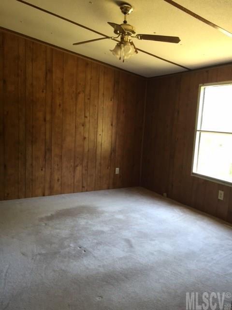 3337 Deal Mill Road Hudson, NC 28638 - Photo 3 of 14 a view of an empty room and a window